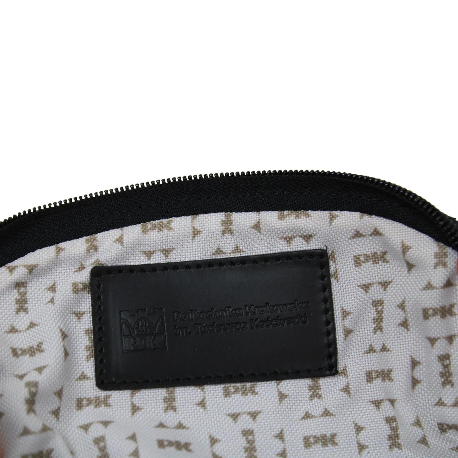 BATYCKI leather toiletry bag - Cracow University of Technology Store BATYCKI leather toiletry bag black with Cracow University of Technology logo inside - close-up on logo