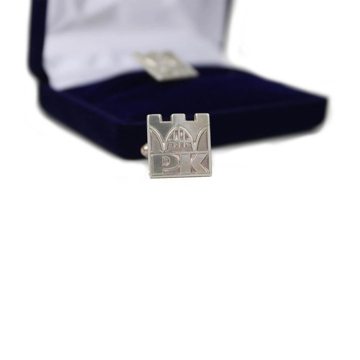 Cufflinks (S) - Cracow University of Technology Store Silver cufflinks in the shape of the Cracow University of Technology logo - close-up to cufflink